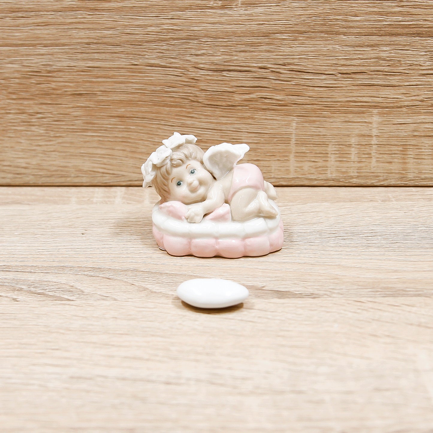Angioletto su Cuscino Rosa
