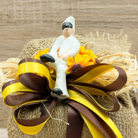 Sacchetto Con Statuina Pulcinella E Girasoli Orchidea Bomboniere